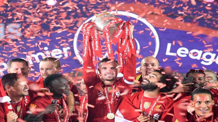 Liverpool lifting the Premier League trophy